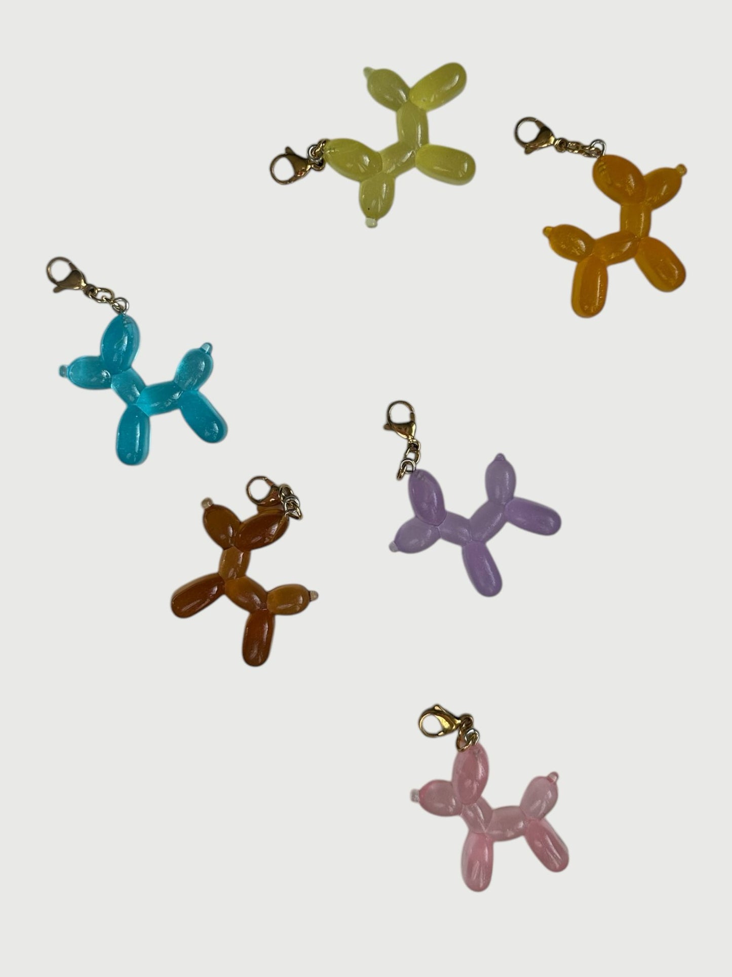 Charm Toy morado