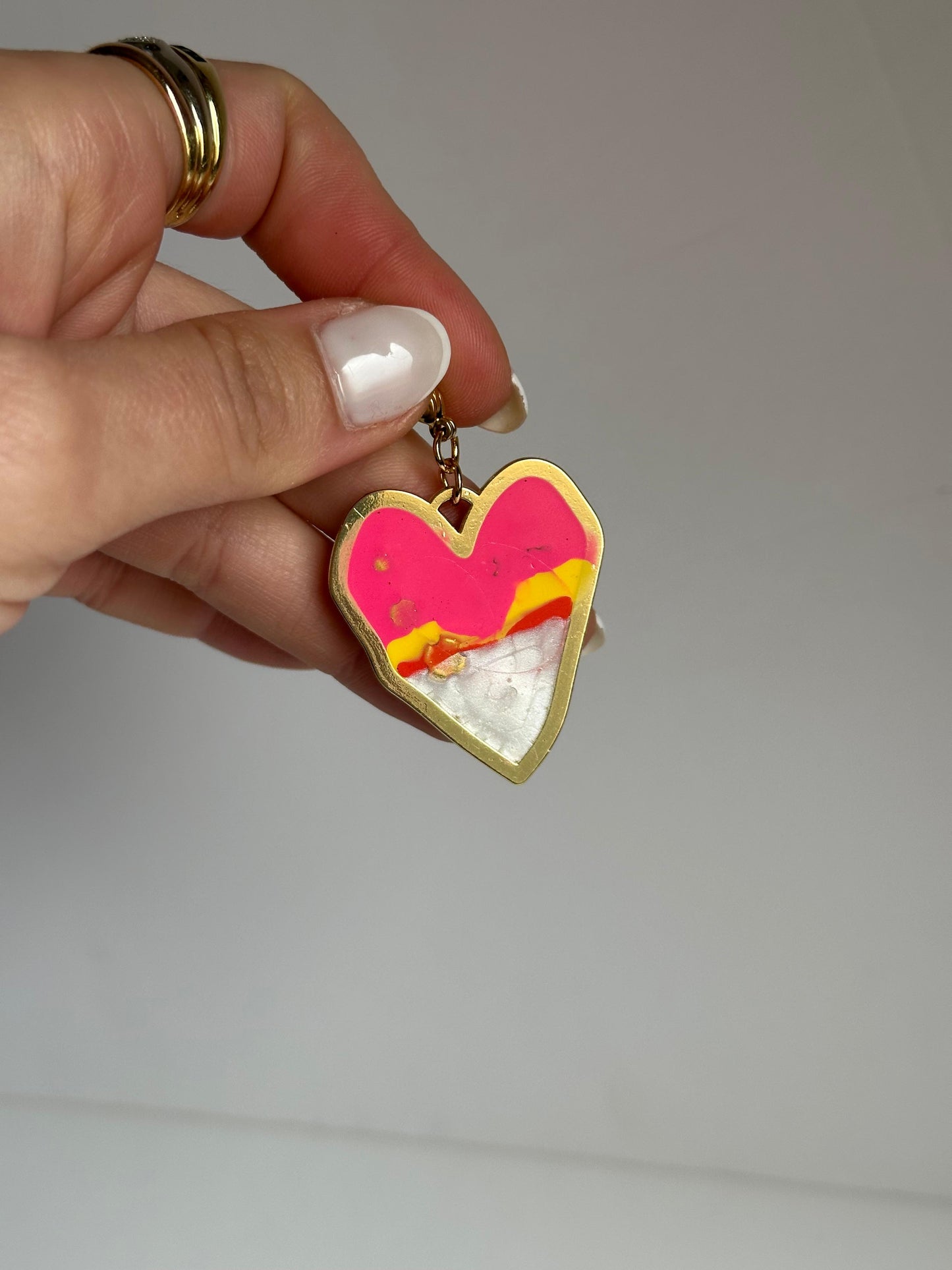 Charm corazón fucsia